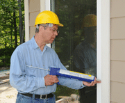 Technican-sealing-air-leaks air leaks in your home, Boston, Northbridge MA